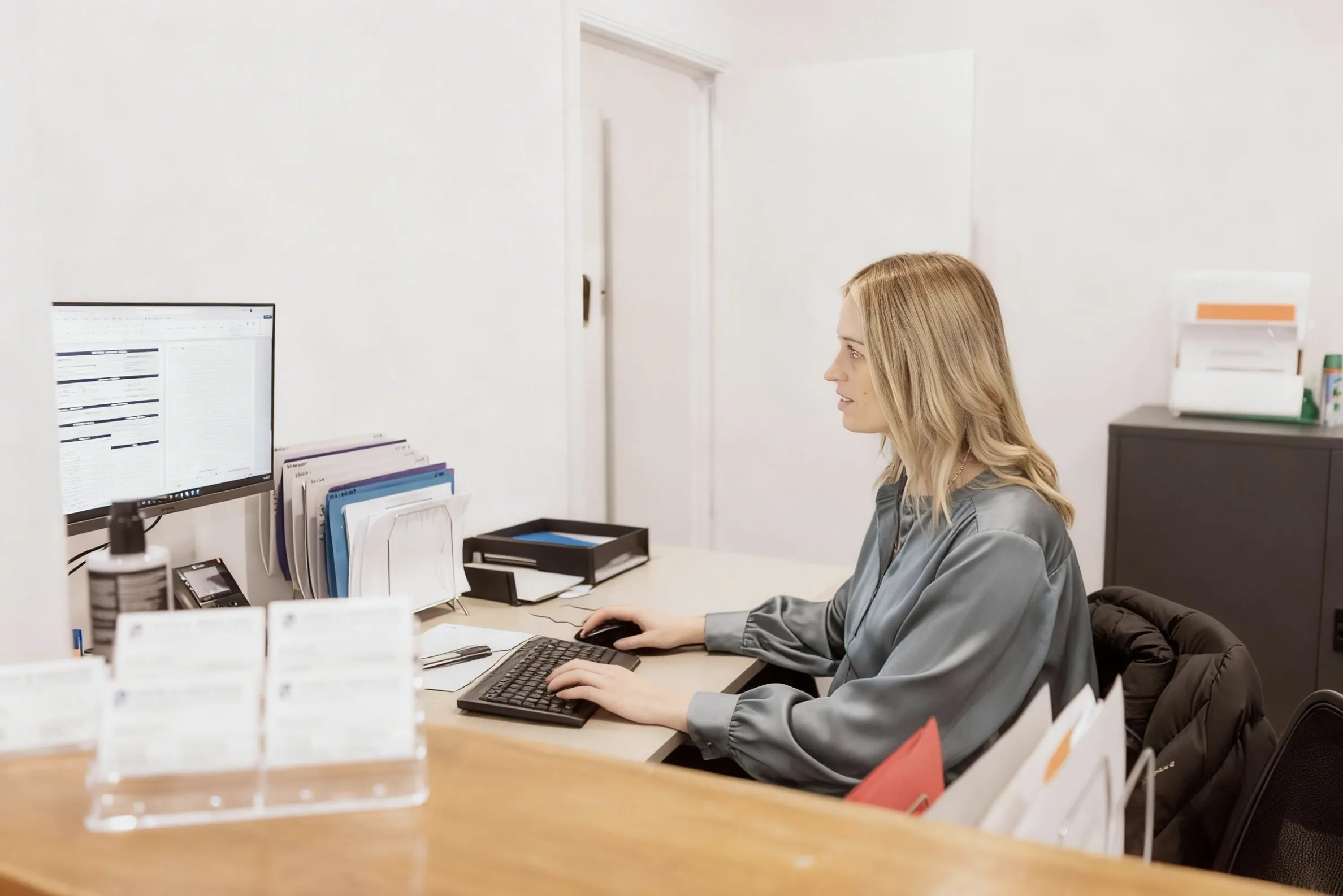 Team member working at the reception