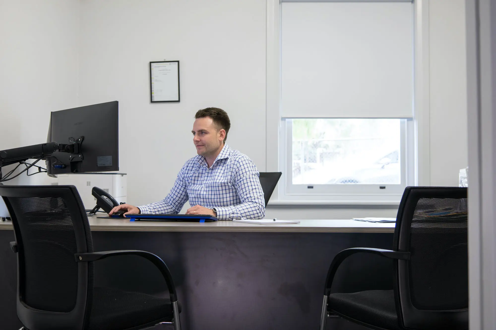 Will Liedig working on desk